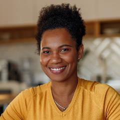 Woman smiling seat at desk