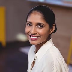 Woman Smiling in Office Setting